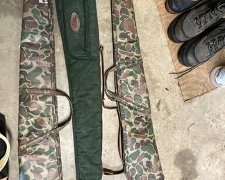 Boyt Green Canvas Gun Case and Two Camouflage Gun Cases