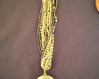 Multi-Strand Beaded Necklace with Large Mother of Pearl Disc Pendant