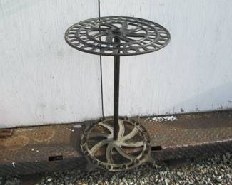 Antique metal broom tool stand