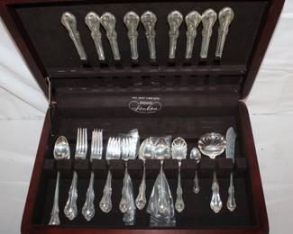 49pcs Sterling Silver Joan of Arc Flatware Set by International  10- teaspoons .....302 grams 8 - ice tea spoons ..249 grams 9 - dinner forks ...449 grams 9 - salad forks.....325 grams 4 serving pieces (gravy ladle, sugar shell spoon, butter knife,