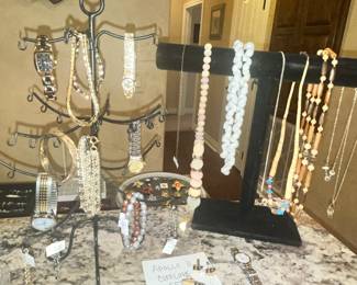 NECKLACES, BRACELETS & WATCHES