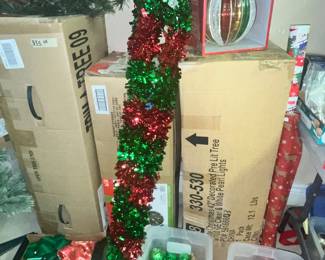 SEVERAL CHRISTMAS TREES IN BOXES