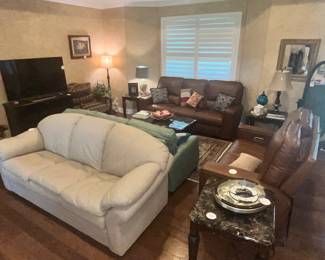 A ROOM FULL OF LEATHER SEATING!!