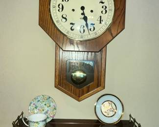 HOWARD MILLER WALL CLOCK & BRASS TRIMMED WALL SHELF