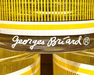 A set of yellow striped mid-century modern rocks glasses designed by Georges Briard, circa 1960s–1970s.