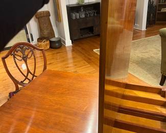 Antique Barnard & Simonds Grand Rapids flip-top game table with interior storage compartment.