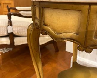 French Louis XV Style Marble-Top Side Table with Gilt Finish and Curved Legs.