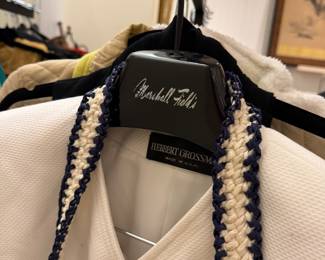 Herbert Grossman white textured blazer with braided navy trim and gold button.