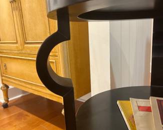 Round 2-Tier Accent Table – Black round two-tier accent table with decorative curved legs, perfect for living room or bedside storage.