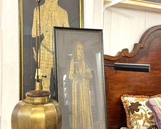 A pair of gold-on-black medieval-style figural artworks resembling illuminated manuscript figures, likely 20th-century decorative prints or panels inspired by Gothic manuscripts, circa 1960s–1980s.