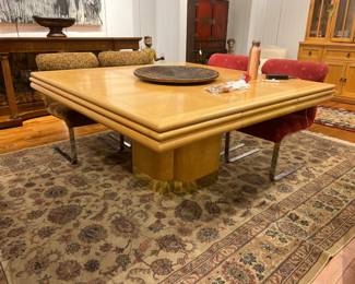 Large Mid-Century Modern Oak Dining Table with Pedestal Base and Brass Accent Trim.