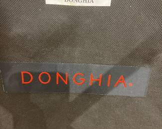 Designer upholstered dining chair with patterned fabric by Donghia.