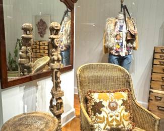 Wicker "Burlington" Armchair - vintage high-back natural rattan armchair with a "rolled" arm as well as a Polynesian Totemic Post.