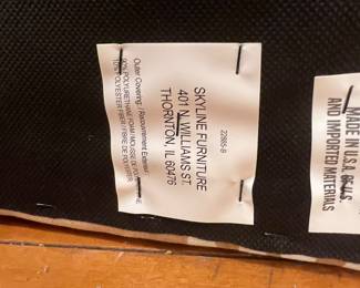Skyline Furniture upholstered accent chair label, made in USA.