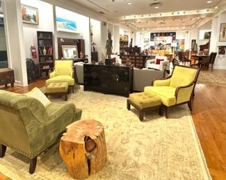 Hollywood Regency Wingback Set - mid-century high-back lounge chairs and matching tufted ottomans. Also seen is a Live-Edge Log Side Table
