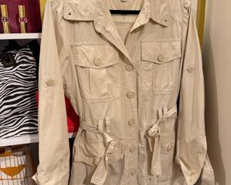 Tommy Hilfiger beige utility jacket with button front, flap pockets and adjustable waist ties.