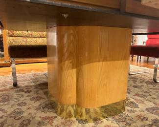 Expandable Mid-Century Oak Dining Table with Pull-Out Leaves and Pedestal Base.
