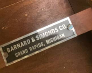 Antique Barnard & Simonds Grand Rapids flip-top game table with interior storage compartment.