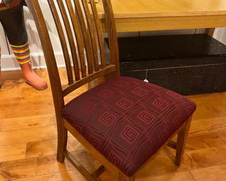 Solid wood mission-style dining chair with slatted back and upholstered burgundy seat.
