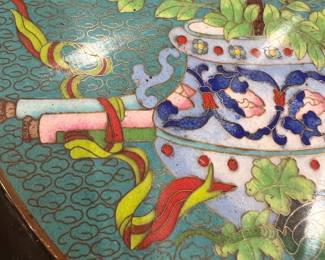 Close-Up Cloisonné-Style Inlay Detail with Floral and Ribbon Motif on Asian Coffee Table.