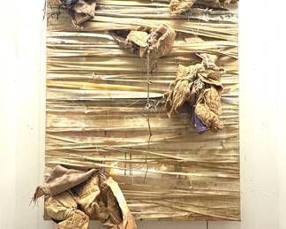 A mixed-media fiber assemblage wall artwork using layered textile and organic materials, in the style of 1960s–1970s contemporary fiber art, reminiscent of artists like Sheila Hicks.