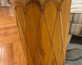 Hand-carved rope-tension African style drum with natural hide head and wood body.