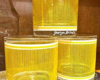 A set of yellow striped mid-century modern rocks glasses designed by Georges Briard, circa 1960s–1970s.