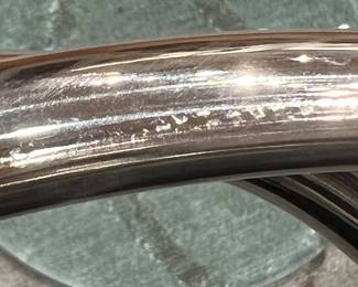 Roche Bobois Side Table – Modern Roche Bobois chrome spiral base side table with round glass top, sleek contemporary accent piece.