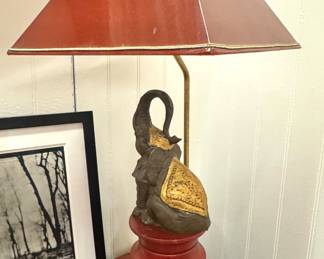 A table lamp with sculptural elephant base and pagoda-style shade, in Hollywood Regency / Asian revival style, circa 1960s–1970s.