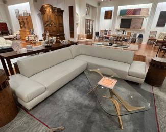 Modern Italian Style Sectional Sofa in Cream Leather with Low Profile Contemporary Design.