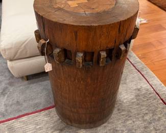 Traditional wooden rice pounder mortar (also called a “usu” or large grain mortar) that’s been repurposed as a rustic side table or pedestal.