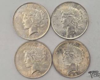 1308  4 Silver Peace Dollars 