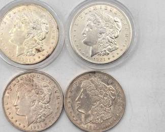 1306  4 1921 Morgan Silver Dollars 