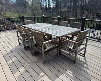 Kingsley-Bate Hyannis Teak Outdoor Dining Table With Butterfly Leaf Storage - (74”-106"L x 44"W x 29"H) with Kingsley-Bate Teak Outdoor Armchairs (22.5"W x 23"D x 36"H / 8 Total)
