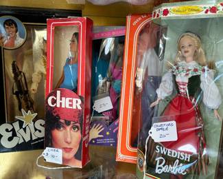  Collectible Barbies and dolls