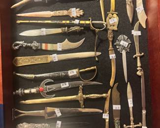 COLLECTION OF INTERNATIONAL LETTER OPENERS, KNIVES AND DAGGERS