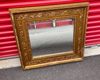 Ornate gold mirror