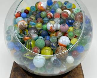 Hundreds Of Vintage Glass Marbles In Glass Vase On Wood Base Lot #: 43