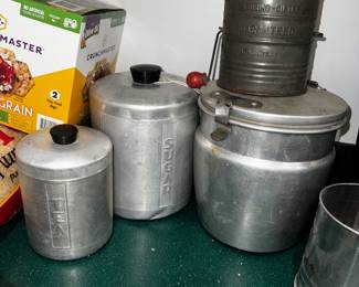 Vintage canisters including a fresh o lator