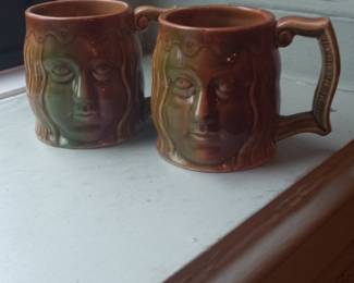 Pair of Jim Rumph Pottery Face Mugs