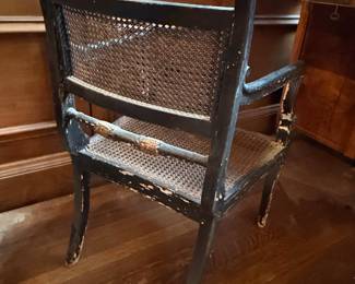 Regency Style Ebonized and Gilt Stenciled Cane Seat Armchair