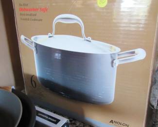 Lots of Anolon pots and pans. Most barely used or new in box!