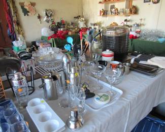 Garage with entertaining items, cooking items, decor, tools and so much more!