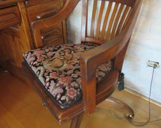 Wood chair on rollers