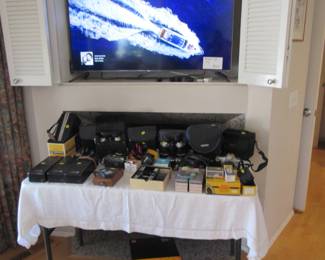 Cameras, projectors, binoculars. Roku TV!