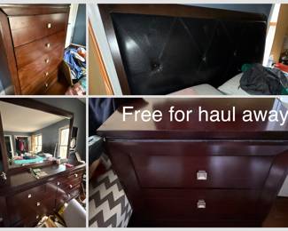Free bedroom set. Queen bedframe, mattress not included, two nightstands, a tall dresser, a short dresser with a mirror, and they all have secret compartments