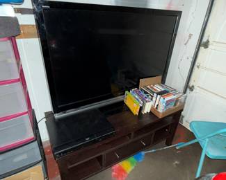 52” tv. Works fine $30. Haul it out. The stand is free 