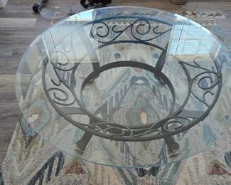 Glass top cocktail table