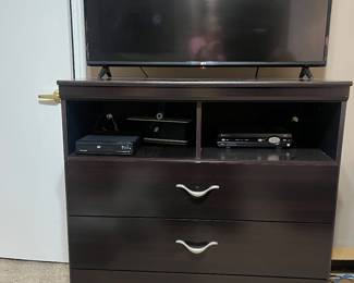 Black tv stand and LG stand 