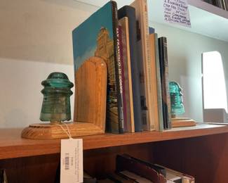 Vintage teal glass telegraph insulator and oak wood bookends $50 + tax